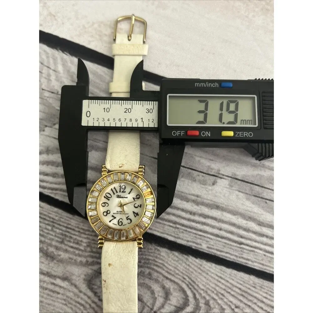 Vienna Gold Tone White Band Women’s Quartz Watch